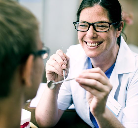 dentist with patient